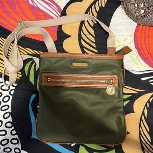 Michael Kors  adjustable cross body or shoulder carry